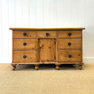An English Country 7 Drawer Pine Buffet or Sideboard