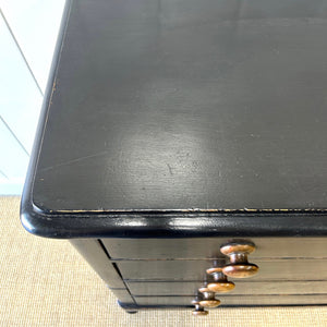 A Tall Ebonized Antique English Chest of Drawers/Dresser