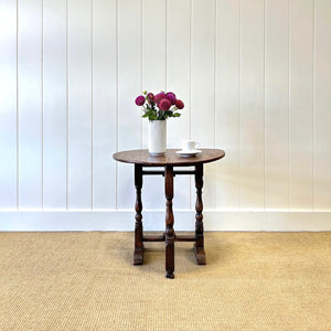 An Antique English Country Oak Folding Occasional Table