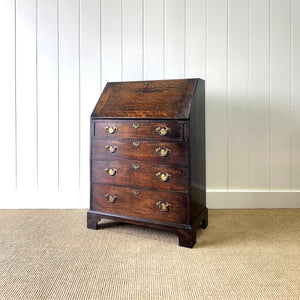 An Antique Oak Drop Front Desk with Original Brass Hardware c1890