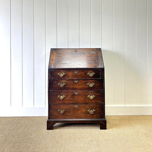 An Antique Oak Drop Front Desk with Original Brass Hardware c1890