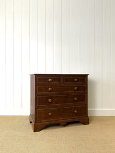 A English George III Oak Country Built Feather-banded Chest of Drawers