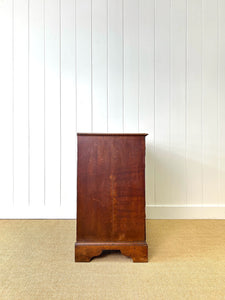 A English George III Oak Country Built Feather-banded Chest of Drawers