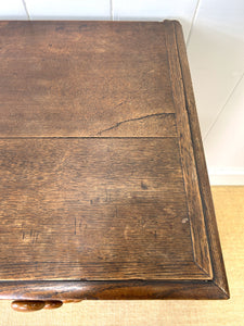 A English George III Oak Country Built Feather-banded Chest of Drawers