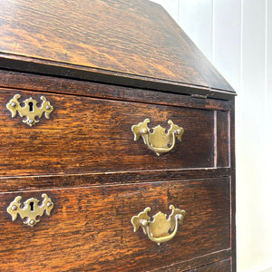 An Antique Oak Drop Front Desk with Original Brass Hardware c1890