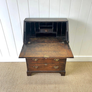 An Antique Oak Drop Front Desk with Original Brass Hardware c1890