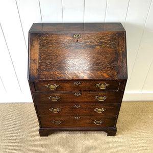 An Antique Oak Drop Front Desk with Original Brass Hardware c1890