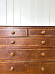A English George III Oak Country Built Feather-banded Chest of Drawers