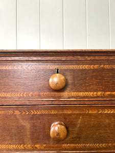 A English George III Oak Country Built Feather-banded Chest of Drawers