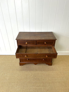 A English George III Oak Country Built Feather-banded Chest of Drawers