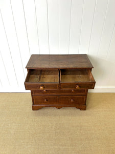 A English George III Oak Country Built Feather-banded Chest of Drawers