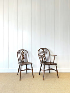 A Set of 8 Windsor Wheel Back Chairs