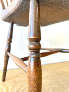 A Set of 8 Windsor Wheel Back Chairs
