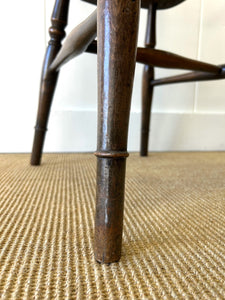 A Set of 8 Windsor Wheel Back Chairs