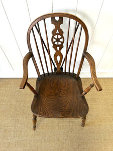 A Set of 8 Windsor Wheel Back Chairs
