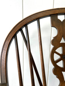 A Set of 8 Windsor Wheel Back Chairs