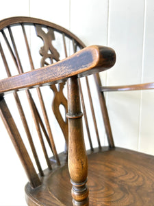 A Set of 8 Windsor Wheel Back Chairs