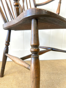 A Set of 8 Windsor Wheel Back Chairs