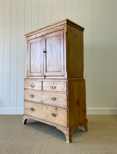 An 18th Century English Pine Linen Press Cupboard