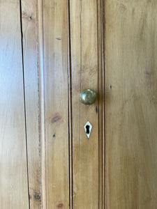 An 18th Century English Pine Linen Press Cupboard