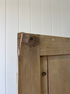 An 18th Century English Pine Linen Press Cupboard