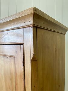 An 18th Century English Pine Linen Press Cupboard
