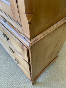 An 18th Century English Pine Linen Press Cupboard