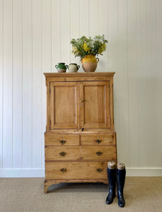 An 18th Century English Pine Linen Press Cupboard