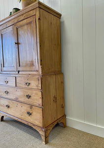 An 18th Century English Pine Linen Press Cupboard
