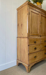 An 18th Century English Pine Linen Press Cupboard