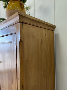 An 18th Century English Pine Linen Press Cupboard