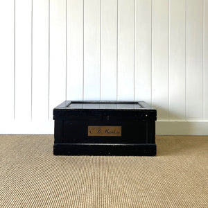 An Ebonized Campaign Sea Chest