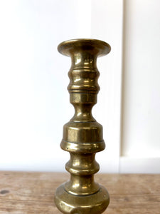 A Pair of Antique Brass Candlesticks