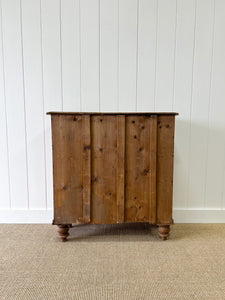 An Antique English Pine Chest of Drawers Dresser with Dark Wooden Knobs
