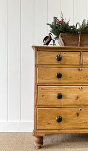 An Antique English Pine Chest of Drawers Dresser with Dark Wooden Knobs