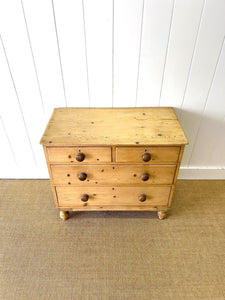 A 19th Century English Pine Chest of Drawers/Dresser with Tulip Feet