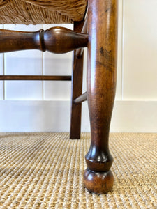 A Vintage Set of 8 English Oak Ladder Back Chairs with 2 Captain's Chairs
