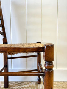 A Vintage Set of 8 English Oak Ladder Back Chairs with 2 Captain's Chairs
