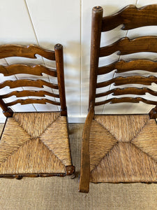 A Vintage Set of 8 English Oak Ladder Back Chairs with 2 Captain's Chairs
