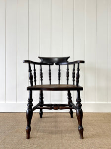 An English Country Oak Bow Arm Chair c1830