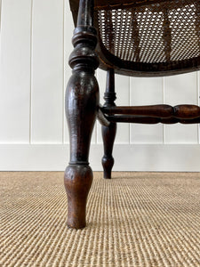An English Country Oak Bow Arm Chair c1830