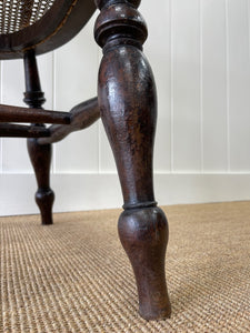 An English Country Oak Bow Arm Chair c1830