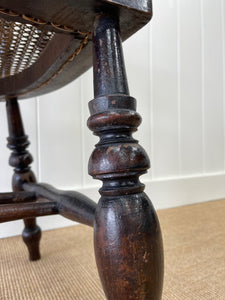 An English Country Oak Bow Arm Chair c1830