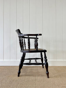 An English Country Oak Bow Arm Chair c1830