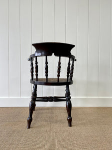 An English Country Oak Bow Arm Chair c1830