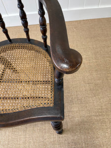 An English Country Oak Bow Arm Chair c1830