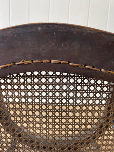 An English Country Oak Bow Arm Chair c1830