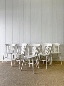 A Vintage Set of 8 Fiddleback Chairs