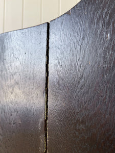An Antique English Oak Settle with Seat Storage