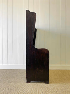 An Antique English Oak Settle with Seat Storage